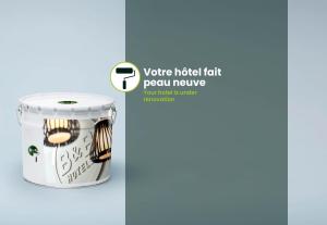 a jar of peanut butter with a picture of a pineapple at B&B HOTEL Lyon Nord 4 étoiles in Dardilly