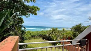 a balcony with a view of the ocean at Karlin #2, Frontline, Beach Access, Scottburgh in Freeland Park