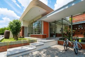 a bicycle parked in front of a building at Villa Ceria Dukuh in Timuran