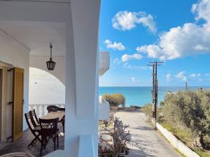 a view of the ocean from a house at Lulus Kastri in Keratokampos