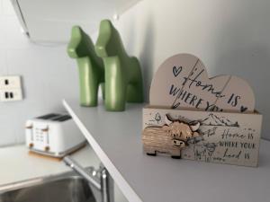 a couple of boxes sitting on top of a counter at Chandelle Park Farm Stay in Exeter