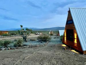 a cabin in the middle of a desert at Star Gazer #3 Glamping in Meadview