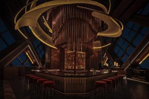 a rendering of a bar with a large organ at SIRO One Za'abeel in Dubai +84 photos