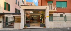 an entrance to a building with glass doors at Casa Per Ferie Canobi 18 in Rome