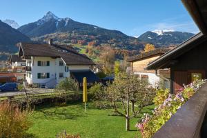 a view from the balcony of a house with mountains in the background at Haus Doro und Kurt in Schruns