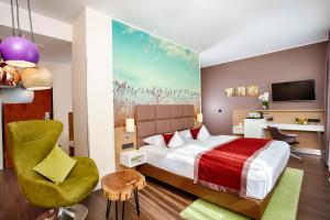 מיטה או מיטות בחדר ב-Best Western Hotel Hohenzollern