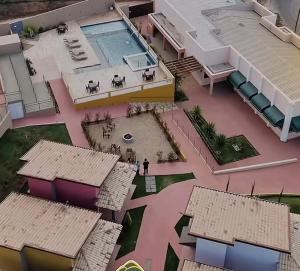 an artist rendering of the proposed redevelopment of a building at Pousada Serra dos Sicalis in Serra Negra