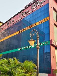 a street light in front of a building at Hotel Tazzodisha Next in Bhubaneshwar