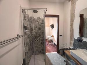 a bathroom with a shower and a sink at Barberini Guest House Palestrina in Palestrina +40 photos