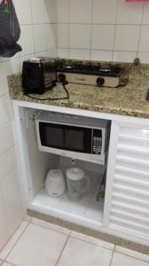 Virtuvė arba virtuvėlė apgyvendinimo įstaigoje Copacabana Studio One