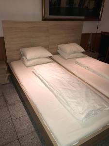 Postel nebo postele na pokoji v ubytování Cáfe 168