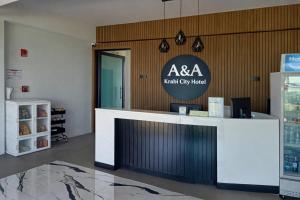 aaa north city hotel reception desk in a building at FHR Krabi City Hotel in Krabi