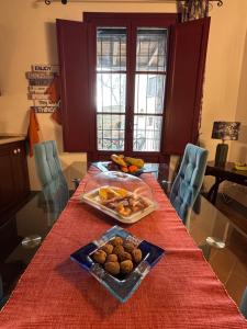 a table with a plate of food on top of it at La Loggia di Montefienali in Gaiole in Chianti