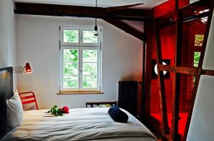 Ένα ή περισσότερα κρεβάτια σε δωμάτιο στο Haus Zauberflöte