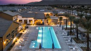 an overhead view of a pool at a resort at Summerwell by AvantStay in La Quinta
