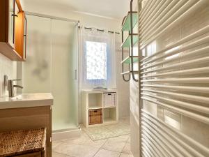 a bathroom with a shower and a sink at Casa Bùri in Trarego +21 photos