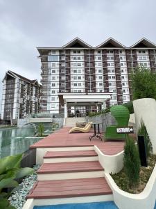 a rendering of a resort with a building at Antara Residential Condominium in Talisay