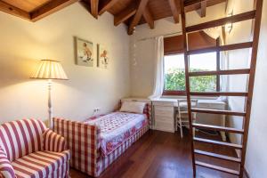 a bedroom with a bunk bed and a ladder at Catalunya Casas A Costa Brava gem - only a few minutes to the beach! in Vidreres +39 photos