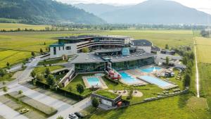 an aerial view of a building with a pool at Alpinresort Kaprun 3 in Kaprun