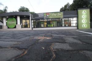 an empty parking lot in front of a store at Aeon Guest House & Spa in Pretoria