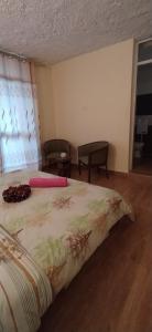 a bedroom with a large bed in a room at Kings Home Stay in Nakuru