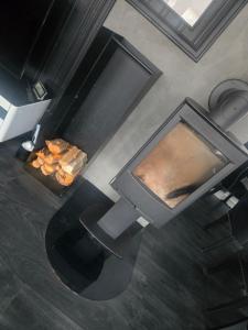 an overhead view of a living room with a fireplace at Takelvdal in Björklid