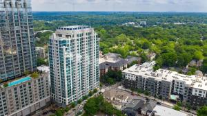 an aerial view of a city with tall buildings at Luxurious Midtown Apartment w Sky Lounge & Pool in Atlanta