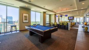a billiard room with a pool table in a building at Luxurious Midtown Apartment w Sky Lounge & Pool in Atlanta