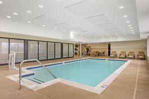 a large swimming pool in a hotel room at Best Western Plus Centralia Hotel & Suites in Centralia