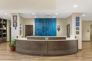 a lobby with a reception desk in a building at Best Western Plus Centralia Hotel & Suites in Centralia +51 photos