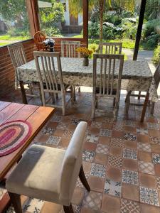a table and chairs sitting on a patio at Hotel las Caballerizas in Valle de Bravo