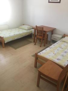 Katil atau katil-katil dalam bilik di Rooms Dujlović