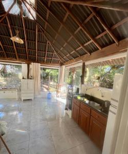 a kitchen with a sink and a counter top at Reserva da Reserva Praia do Forte in Mata de Sao Joao