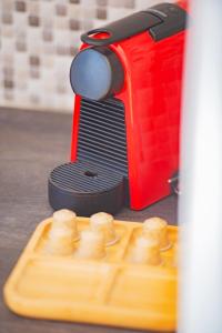 a close up of a toy appliance next to a wooden board at Santo Evdokia in Vóthon