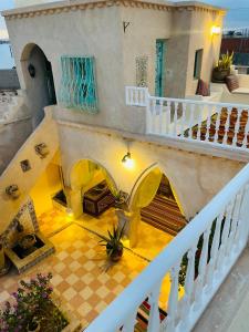 an overhead view of a house with a staircase at Chambre d'hôtes medenine in Medenine
