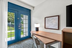 a desk in a room with a window at Spark by Hilton Chattanooga Downtown in Chattanooga