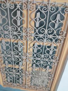 a metal door with a pattern on it at Marrakesh Classic House 20 in Marrakesh
