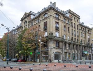 an old building on the corner of a street at Central old town escape in Timişoara