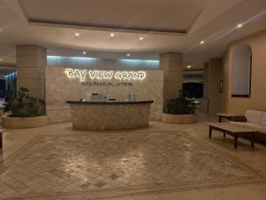 a lobby with a sign for aady view grand at IXTAPA LUXURY - BVG 405 Norte in Ixtapa +26 photos