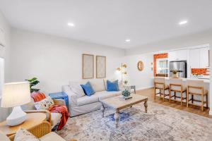 a living room with a couch and a table at The Porter Chamber in Ocean Springs