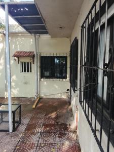 an empty courtyard of a building with a window at Fabylu in Ezpeleta +6 photos