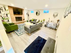 a living room with a couch and a table at Private Residence Below Basement in Thornton