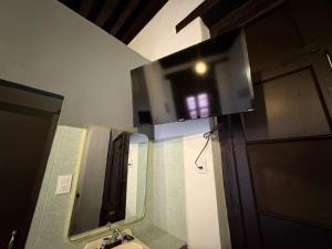 a bathroom with a sink and a large mirror at Hotel Zamora Downtown CDMX in Mexico City +269 photos