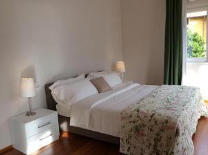 Posteľ alebo postele v izbe v ubytovaní Villa dei Fiori