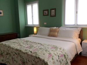 Posteľ alebo postele v izbe v ubytovaní Villa dei Fiori