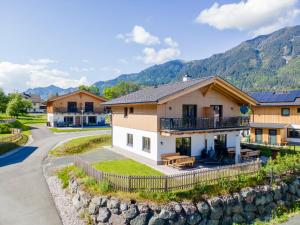 a house in the mountains with a driveway at Obermöschach 7A in Obermöschach