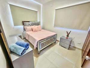 เตียงในห้องที่ Oasis de Paz 2 2