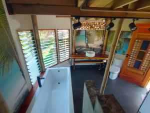an aerial view of a bathroom with a table and a sink at Grandview Cottages Resort in Siaton +126 photos