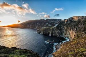 a view of the ocean with a mountain at The Blue Haven Kilcar in Donegal