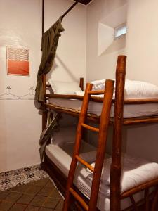 a group of bunk beds in a room at essaouira van hostel in Essaouira +13 photos
